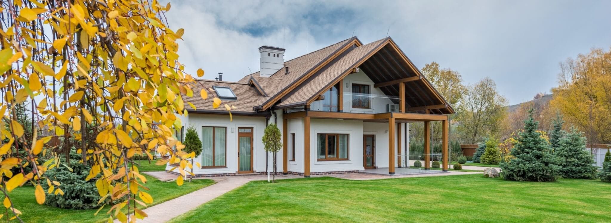 cottage with green lawn