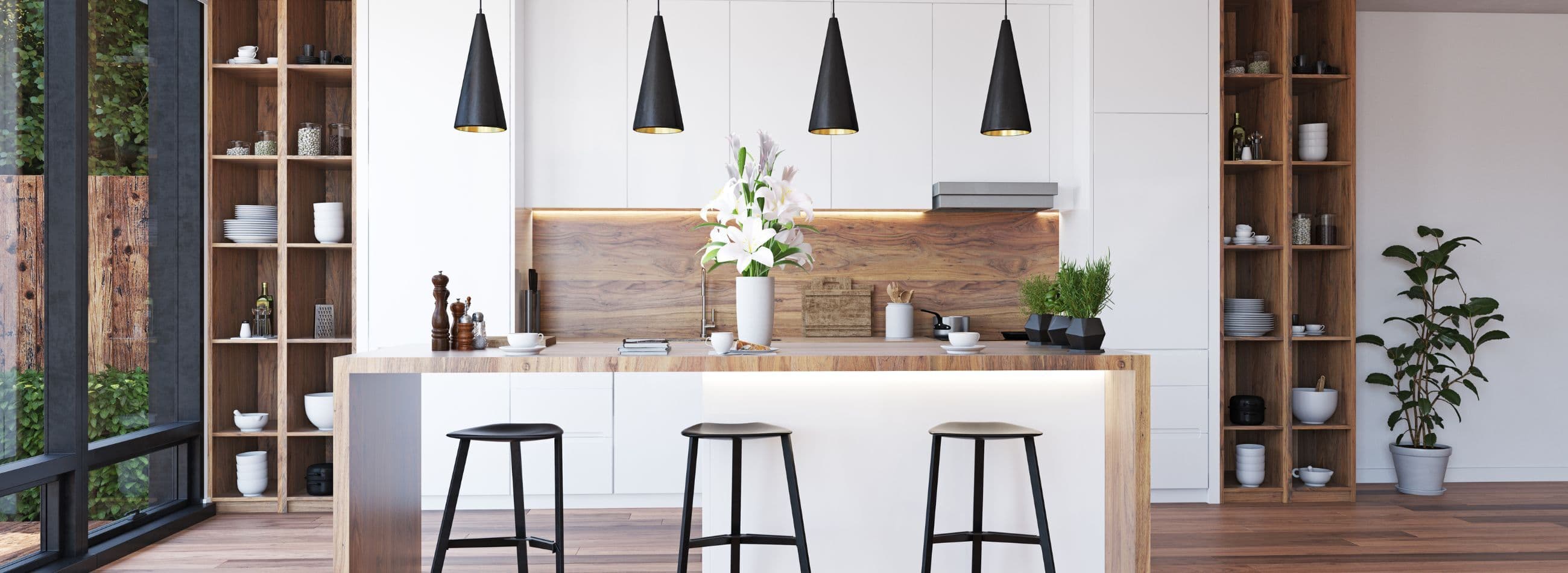 modern kitchen with wood island and white walls