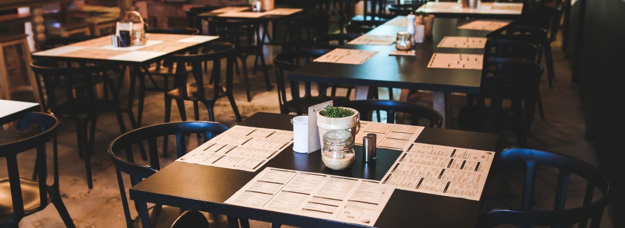 restaurant table with menus